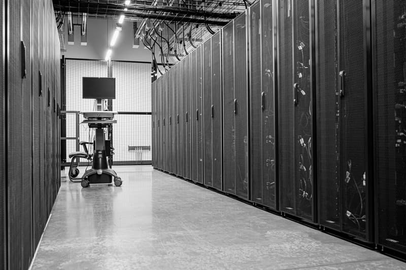 Rows of server racks in a data center